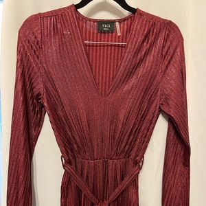 Long sleeved. Brick red colored VICI dress. Size Small